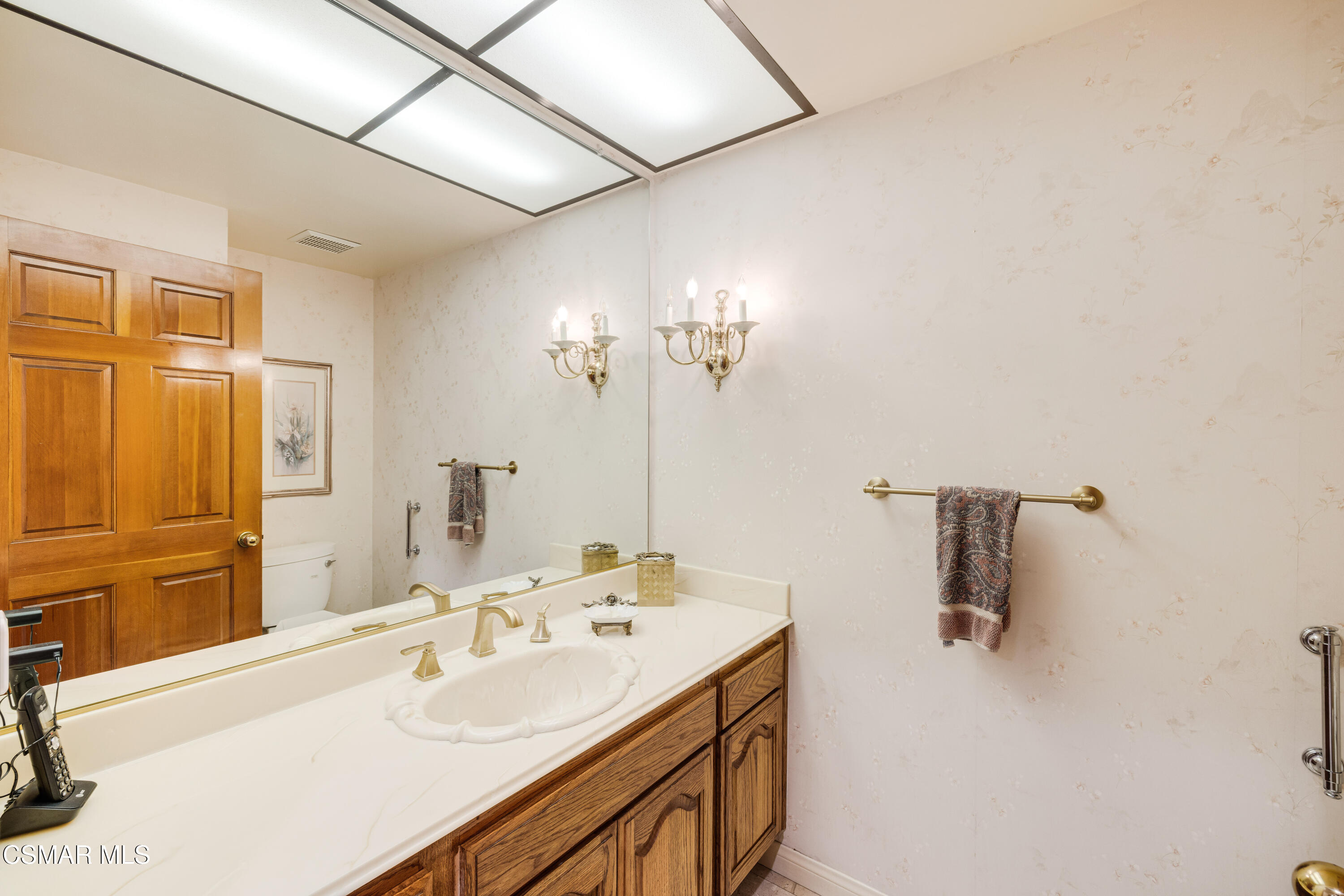 18128 Sandringham Court Porter Ranch, CA 91326 - Photo 24 of 60 Downstairs powder room