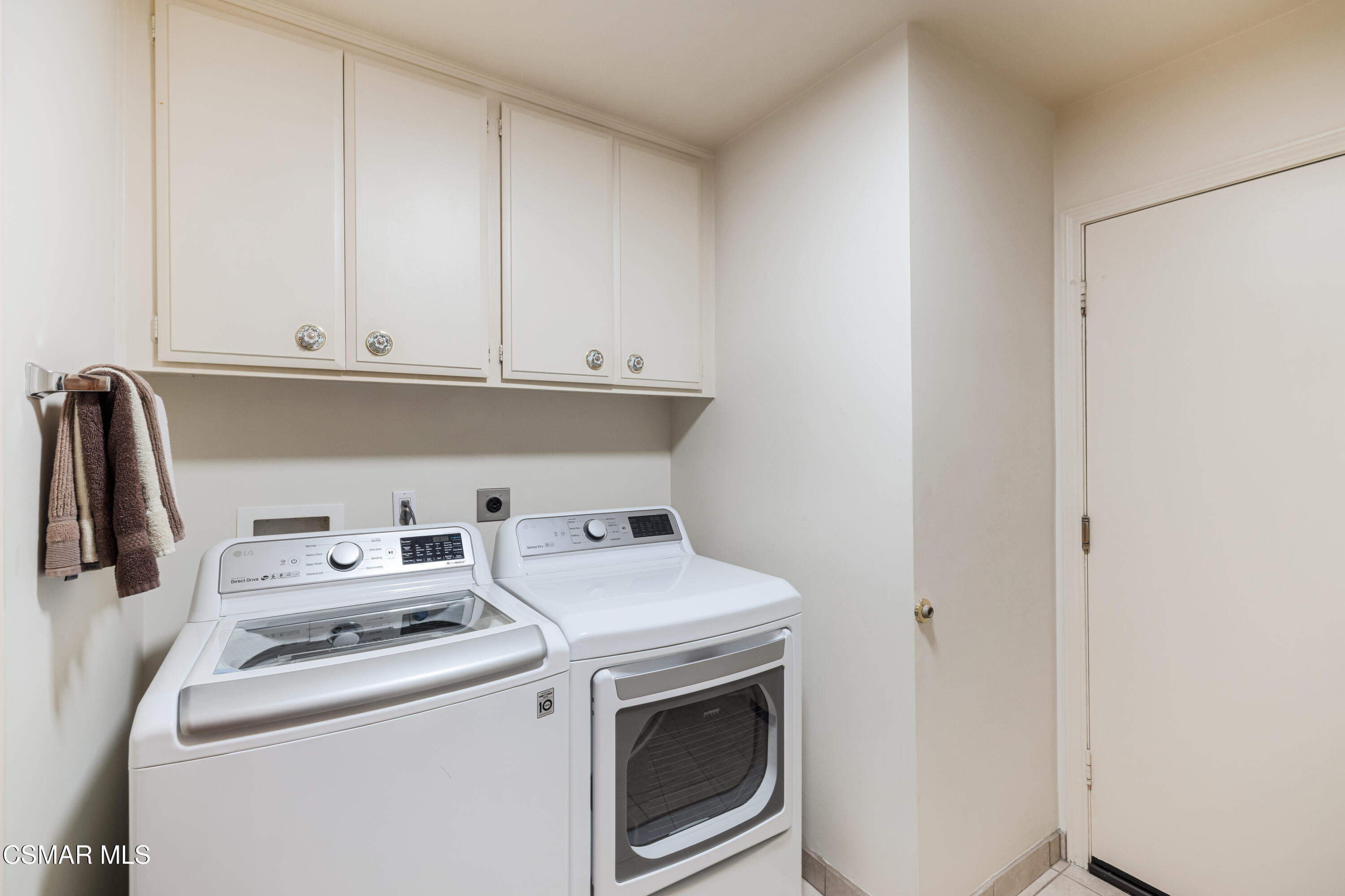 18128 Sandringham Court Porter Ranch, CA 91326 - Photo 26 of 60 laundry room