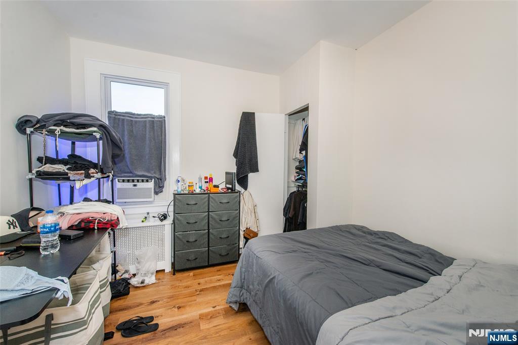 89 King Street Nutley, NJ 07110 - Photo 14 of 32 a bedroom with a bed and furniture