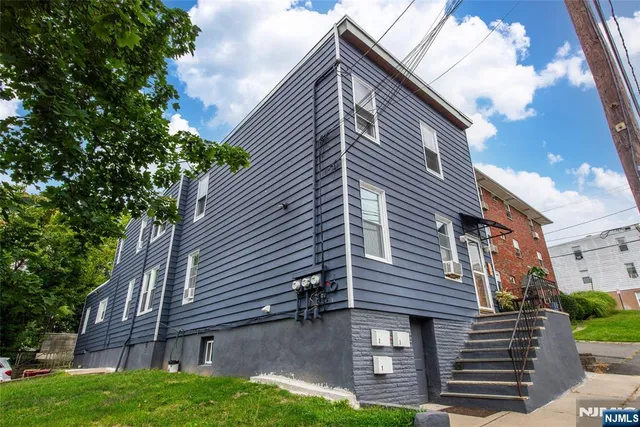 a house view with a backyard space