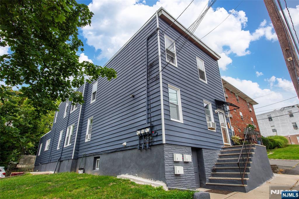 89 King Street Nutley, NJ 07110 - Photo 2 of 32 a house view with a backyard space
