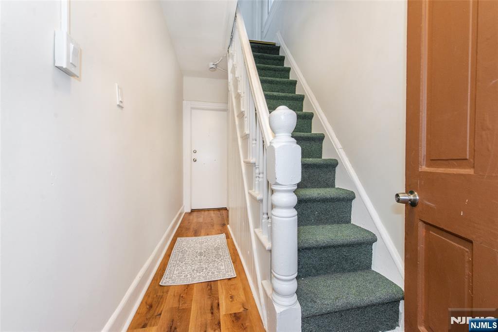 89 King Street Nutley, NJ 07110 - Photo 22 of 32 a view of entryway and hall with wooden floor
