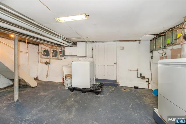 a view of a storage & utility room with utility room