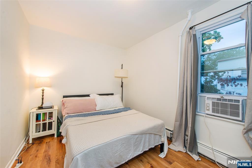 89 King Street Nutley, NJ 07110 - Photo 27 of 32 a bedroom with a bed and a window
