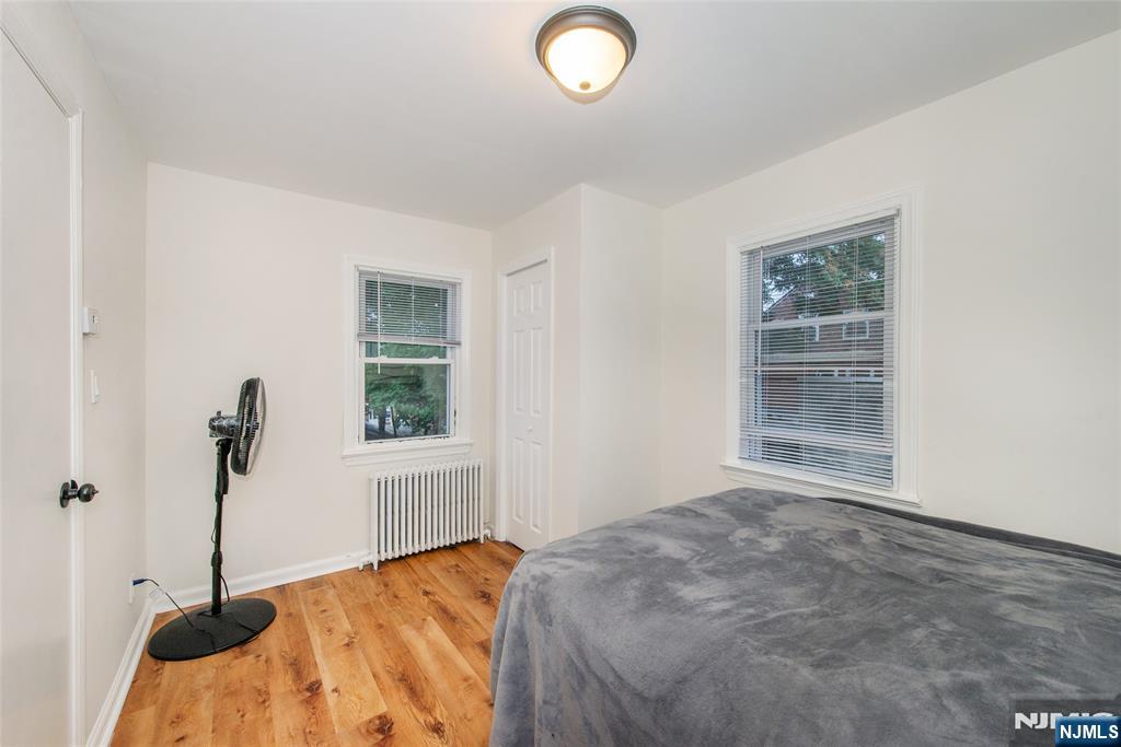 89 King Street Nutley, NJ 07110 - Photo 8 of 32 a bedroom with a bed and a window