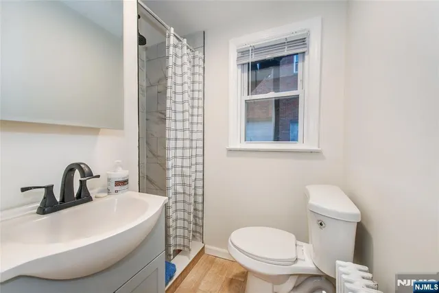 a bathroom with a sink and a toilet