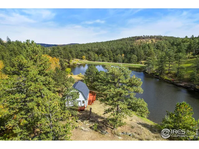 a view of a lake with a mountain in the background