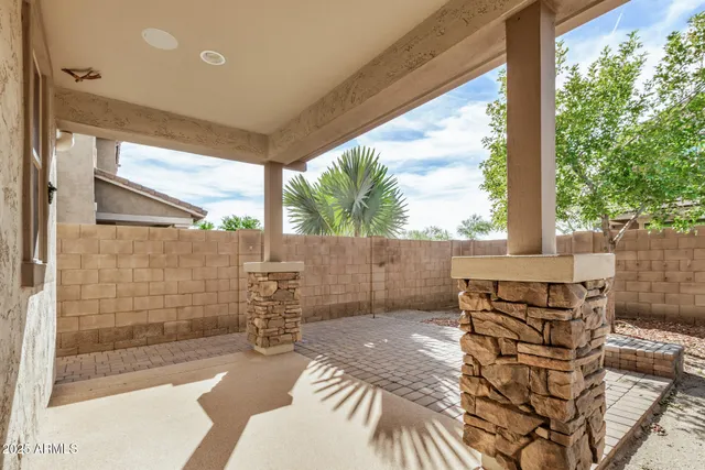 a view of balcony with patio