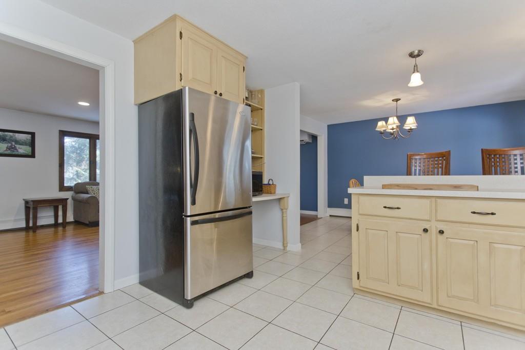 120 Strong Road Southampton, MA 01073 - Photo 15 of 25 a kitchen with white cabinets and stainless steel appliances