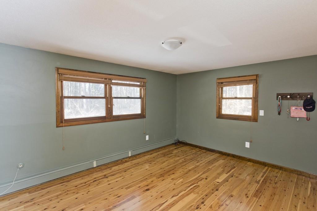 120 Strong Road Southampton, MA 01073 - Photo 19 of 25 a view of a room with wooden floor and windows