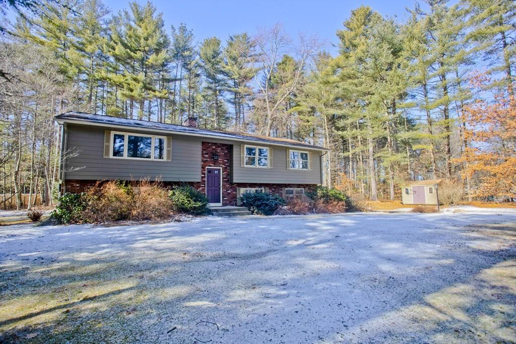 120 Strong Road Southampton, MA 01073 - Photo 2 of 25 a view of a house with a tree in front of it