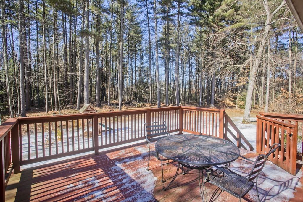 120 Strong Road Southampton, MA 01073 - Photo 4 of 25 a balcony with wooden floor and fence