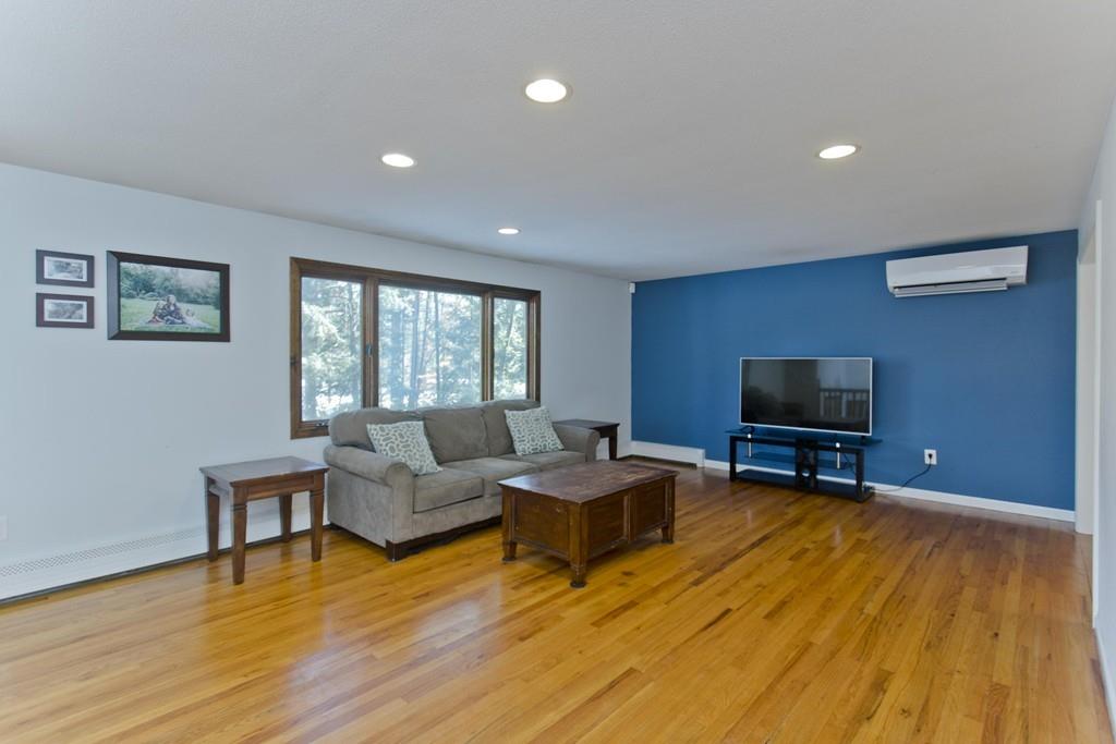 120 Strong Road Southampton, MA 01073 - Photo 6 of 25 a living room with furniture and a flat screen tv