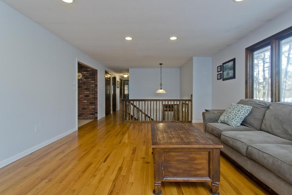 120 Strong Road Southampton, MA 01073 - Photo 8 of 25 a living room with furniture and a wooden floor