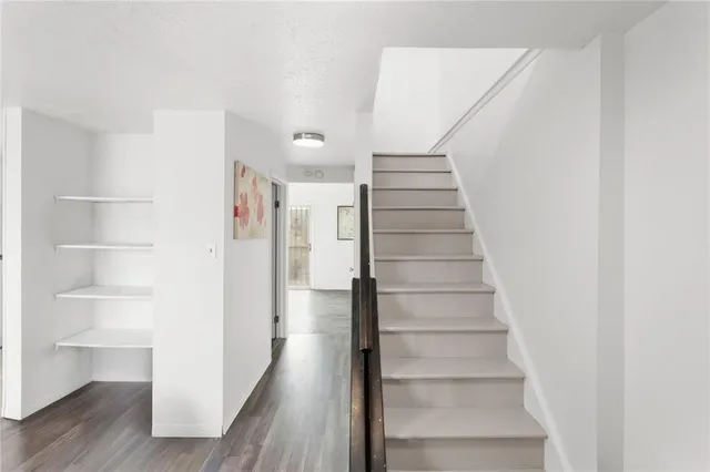 a view of entryway with wooden floor