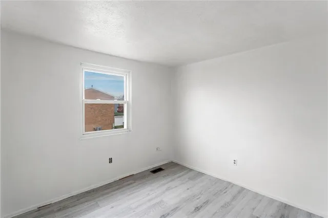 a view of an empty room with window