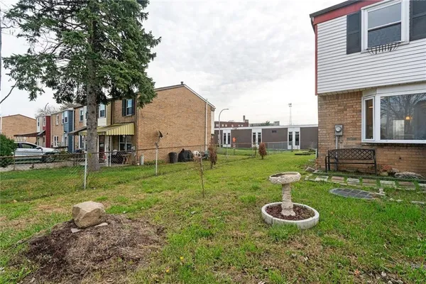 a house view with a garden space