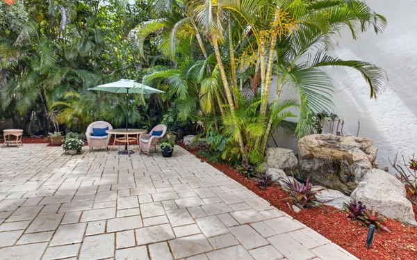 a view of a swimming pool with lounge chair