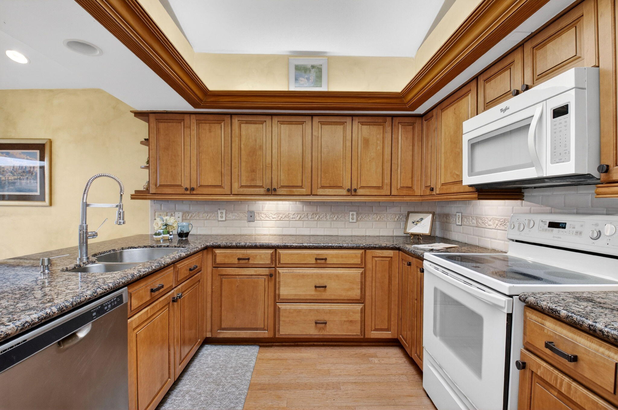 21700 Club Villa Terrace Boca Raton, FL 33433 - Photo 24 of 66 a kitchen with stainless steel appliances granite countertop a sink and cabinets