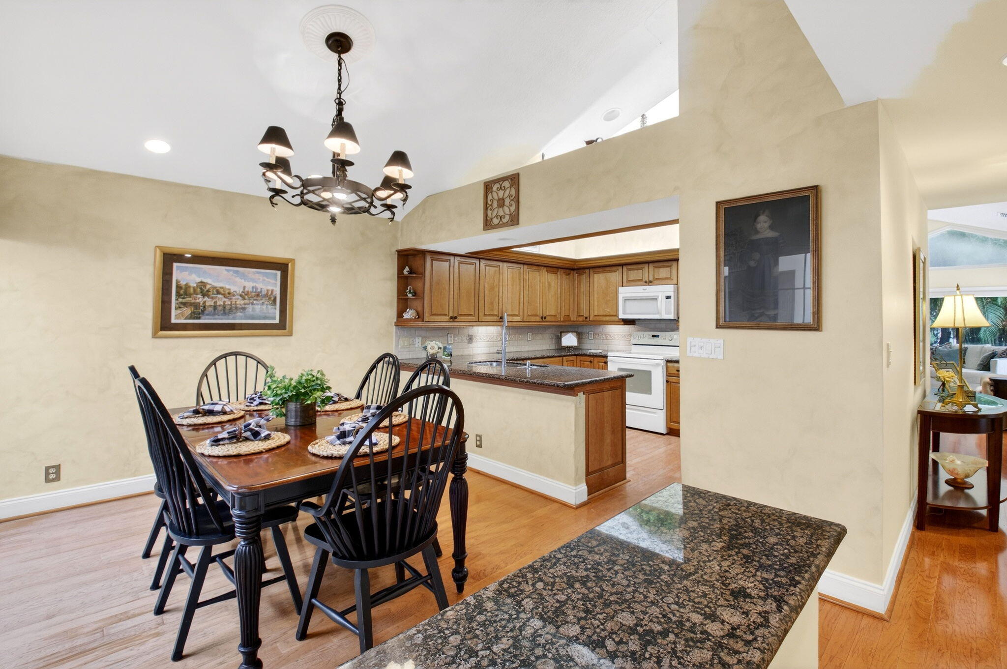 21700 Club Villa Terrace Boca Raton, FL 33433 - Photo 30 of 66 a view of a dining room with furniture and wooden floor