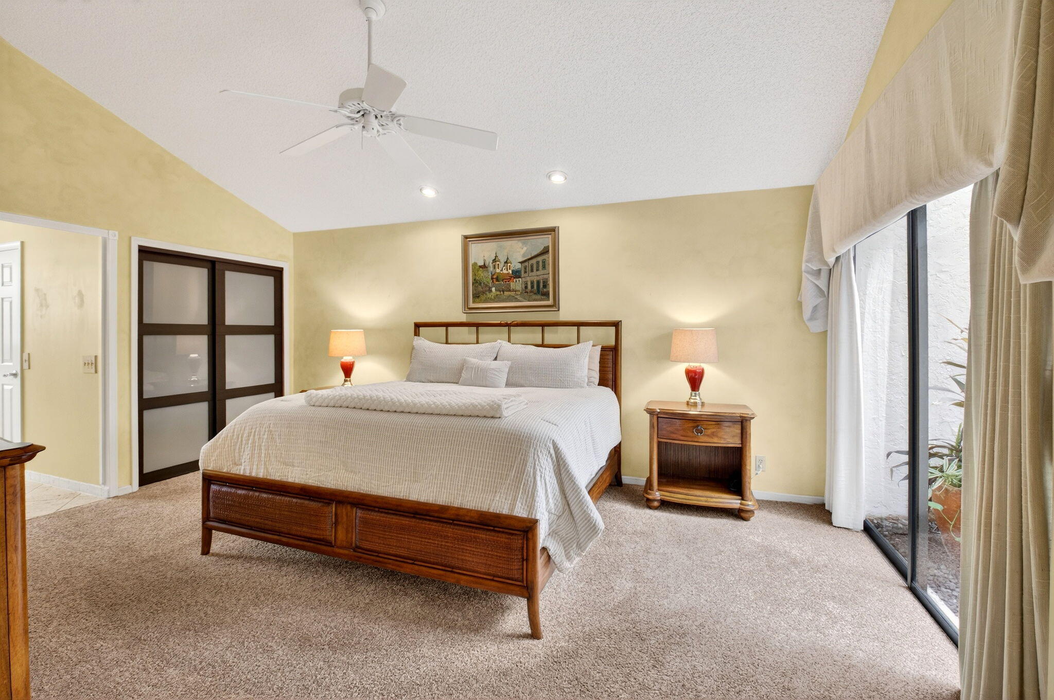 21700 Club Villa Terrace Boca Raton, FL 33433 - Photo 31 of 66 a spacious bedroom with a bed and a window