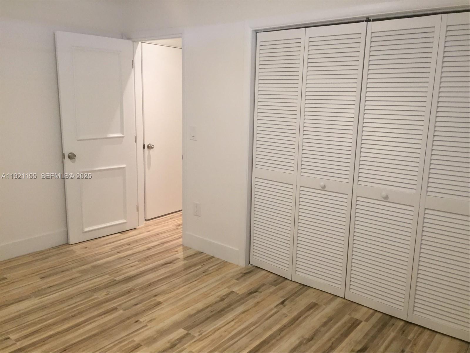 1831 Southwest 17th Terrace Miami, FL 33145 - Photo 10 of 21 a view of a room with wooden floor