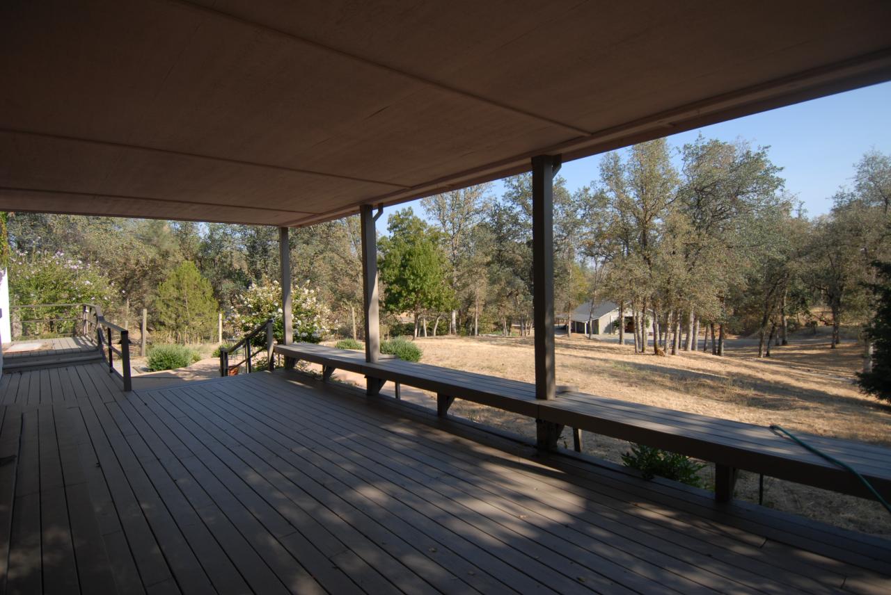 15855 Montgomery Ranch Road Redding, CA 96001 - Photo 2 of 12 a view of a street with wooden floor and outdoor space