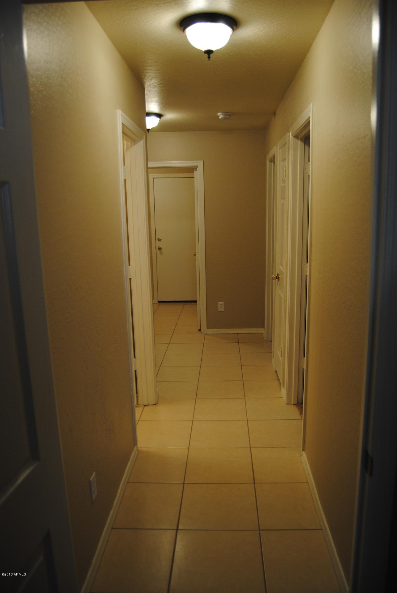 8324 West Cordes Road Tolleson, AZ 85353 - Photo 6 of 15 Tiled Hallways, Bath & Kitchen!