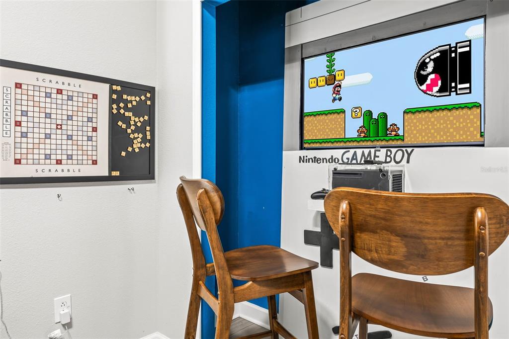 4895 Romeo Circle Kissimmee, FL 34746 - Photo 17 of 93 a view of a dining room with furniture and a potted plant