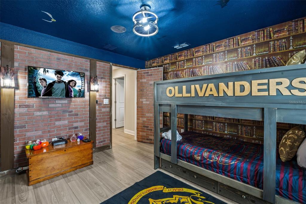 4895 Romeo Circle Kissimmee, FL 34746 - Photo 26 of 93 a living room with furniture and a fireplace