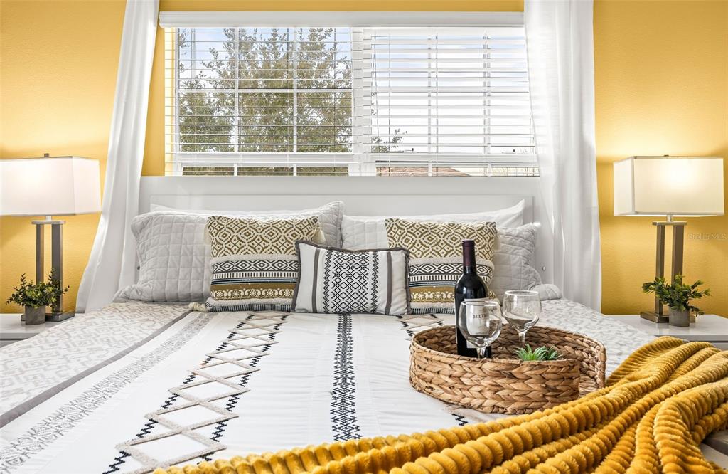 4895 Romeo Circle Kissimmee, FL 34746 - Photo 31 of 93 a living room with a couch and a large window