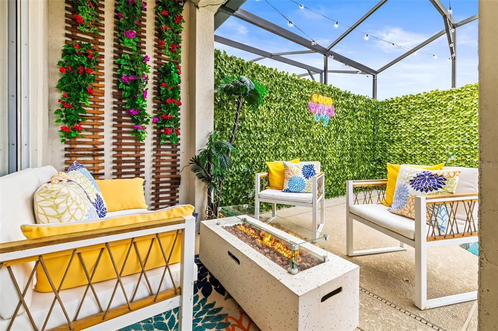 4895 Romeo Circle Kissimmee, FL 34746 - Photo 36 of 93 a view of an outdoor sitting area with a small yard