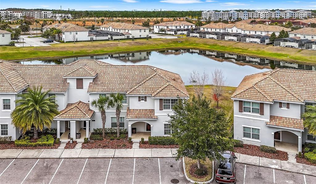 4895 Romeo Circle Kissimmee, FL 34746 - Photo 50 of 93 a view of a swimming pool and outside seating area