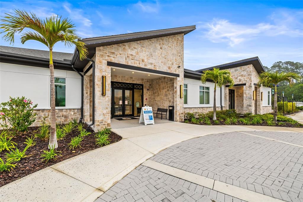 4895 Romeo Circle Kissimmee, FL 34746 - Photo 61 of 93 a front view of a house having yard