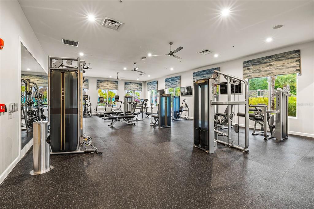 4895 Romeo Circle Kissimmee, FL 34746 - Photo 68 of 93 a view of a room with gym equipment