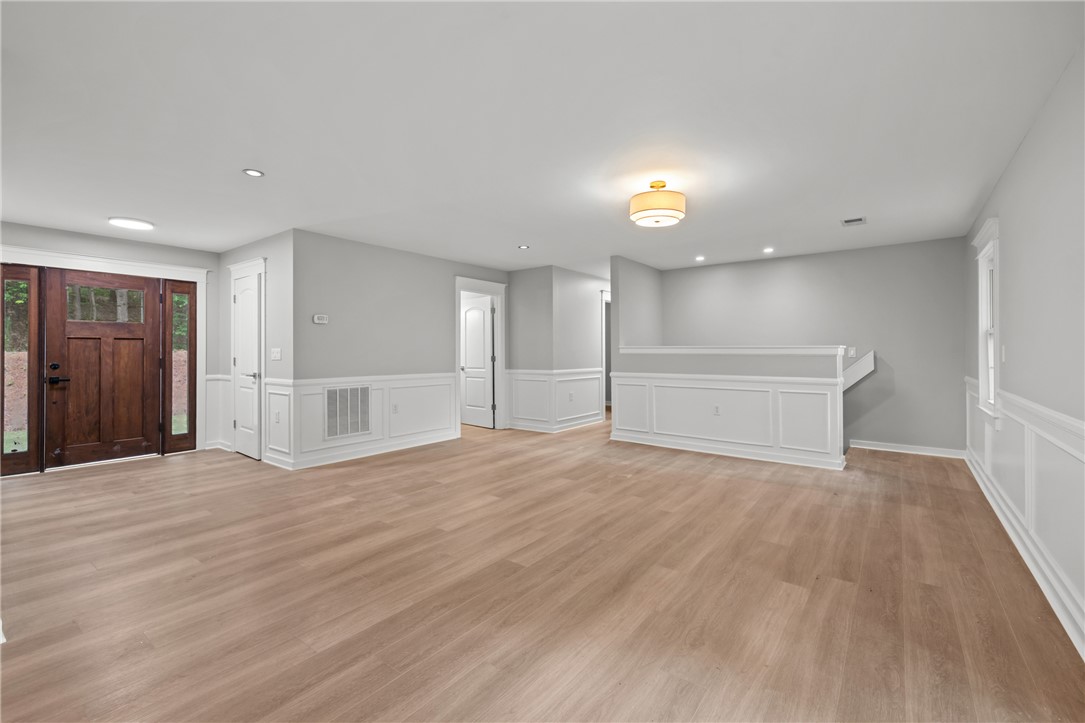 309 Woodland Way Clemson, SC 29631 - Photo 3 of 43 This inviting interior features a warm entrance, offering a blank canvas for personalized living.