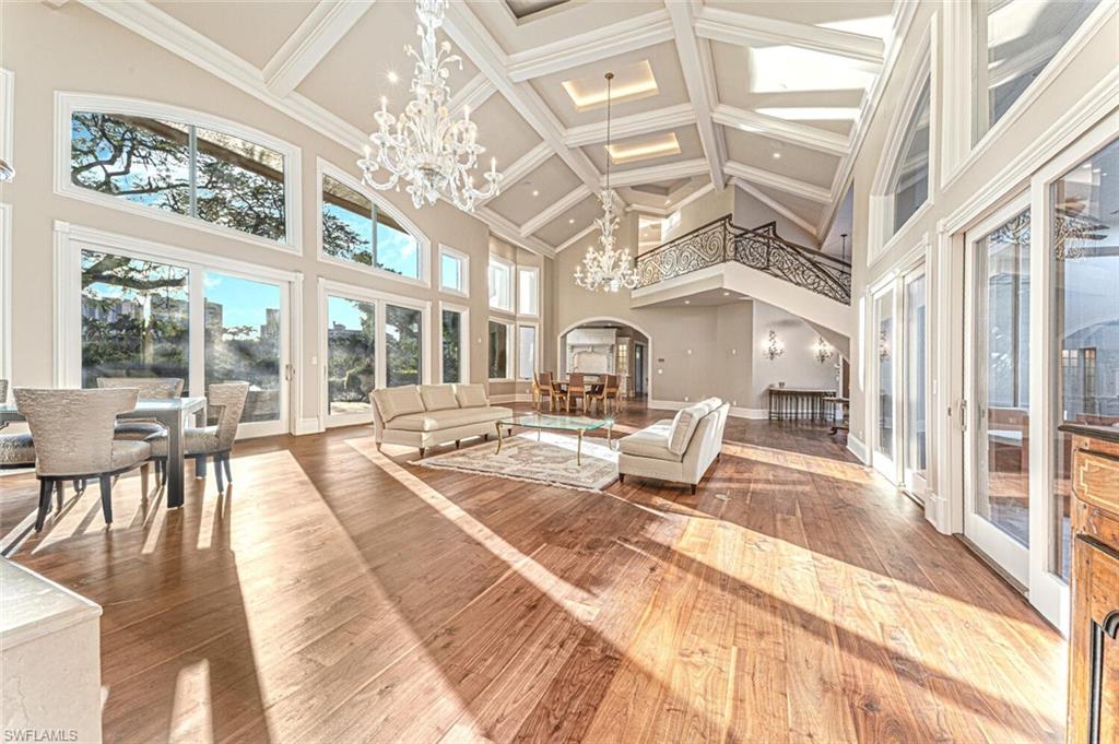 7331 Tilden Lane Naples, FL 34108 - Photo 14 of 50 a spacious bedroom with furniture and a large window
