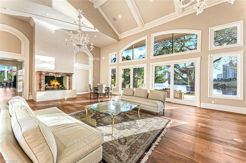 7331 Tilden Lane Naples, FL 34108 - Photo 15 of 50 a living room with furniture and a large window