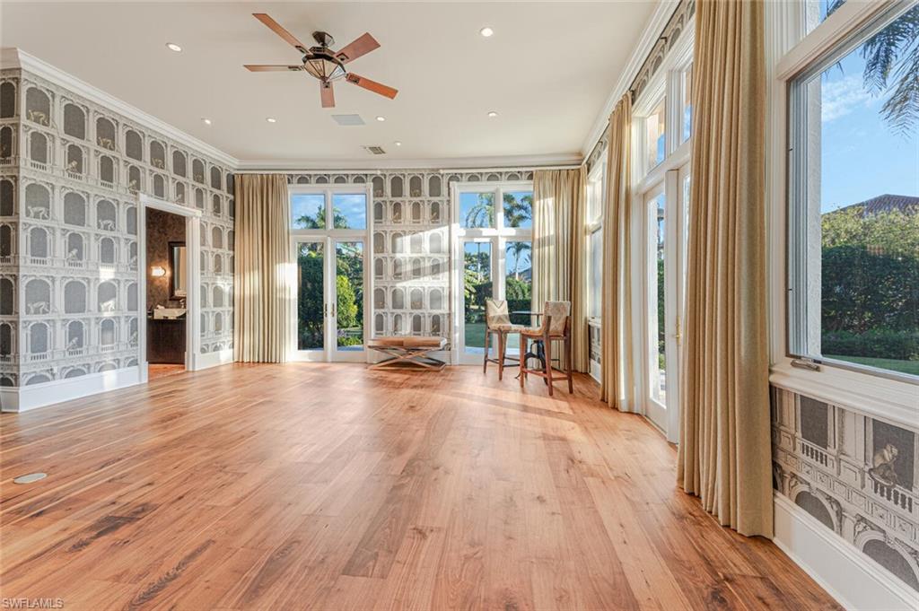 7331 Tilden Lane Naples, FL 34108 - Photo 24 of 50 a view of a livingroom with wooden floor
