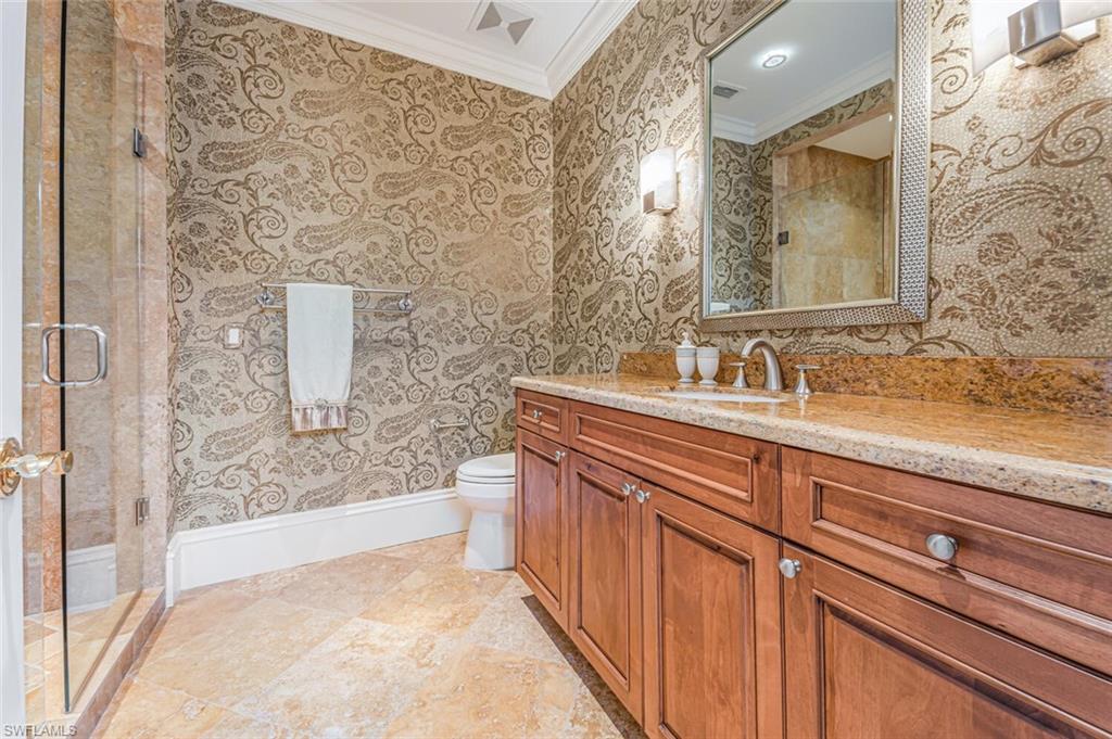 7331 Tilden Lane Naples, FL 34108 - Photo 39 of 50 a bathroom with a sink and a bathtub