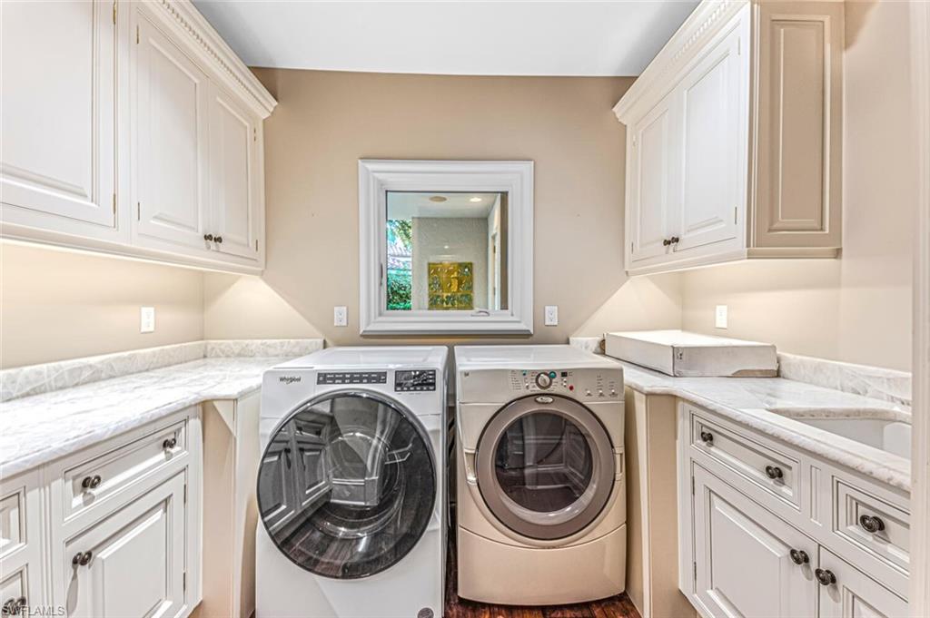 7331 Tilden Lane Naples, FL 34108 - Photo 42 of 50 a utility room with dryer and washer
