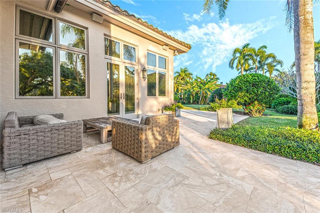7331 Tilden Lane Naples, FL 34108 - Photo 50 of 50 a building exterior with furniture