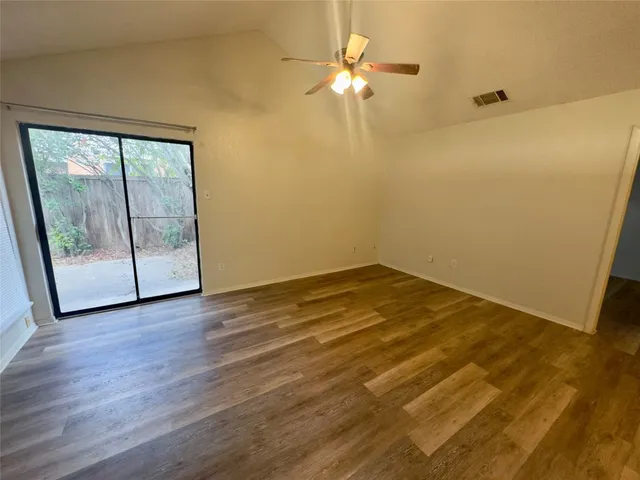 a kitchen with stainless steel appliances granite countertop a stove and a sink