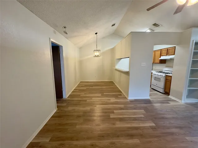 a bathroom with a sink a vanity and a mirror