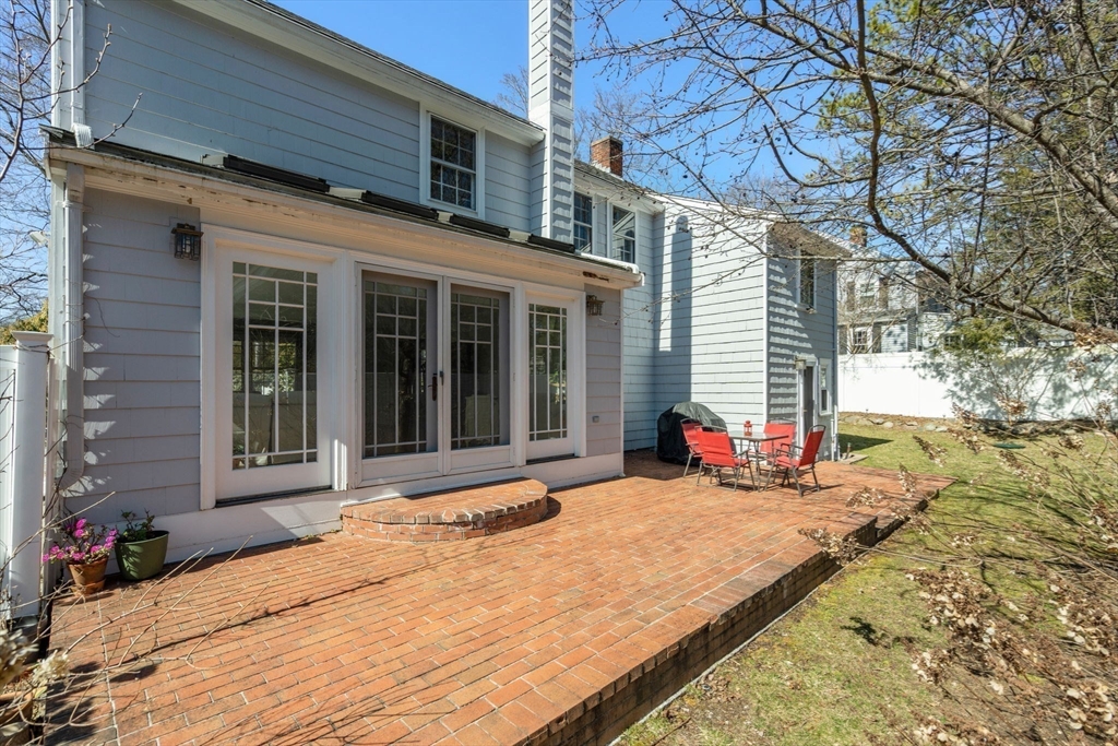46 Leewood Road Wellesley, MA 02482 - Photo 16 of 16 a view of a house with a patio