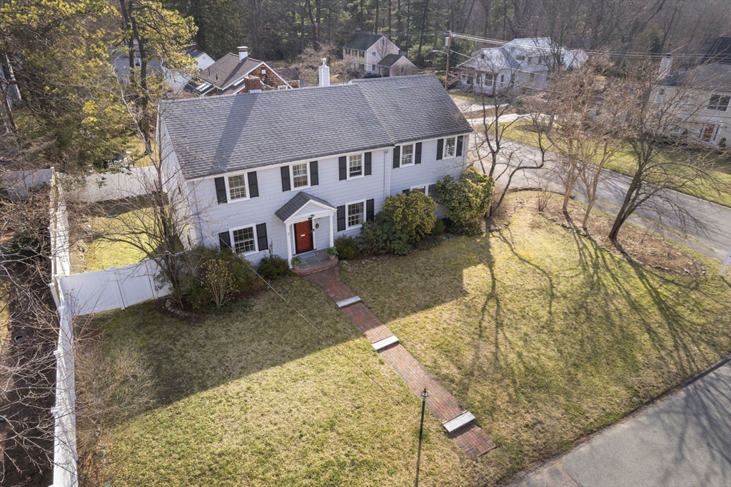46 Leewood Road Wellesley, MA 02482 - Photo 2 of 16 front view of a house with a yard