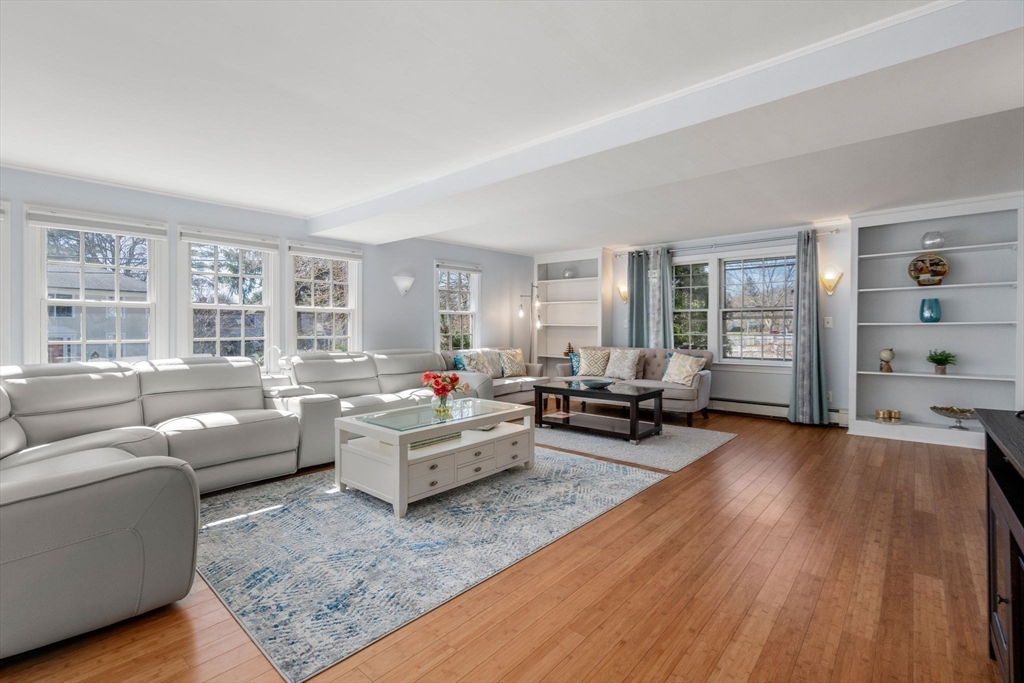 46 Leewood Road Wellesley, MA 02482 - Photo 6 of 16 a living room with furniture and a wooden floor