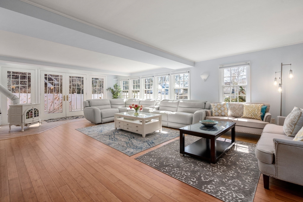 46 Leewood Road Wellesley, MA 02482 - Photo 7 of 16 a living room with fireplace furniture and a rug