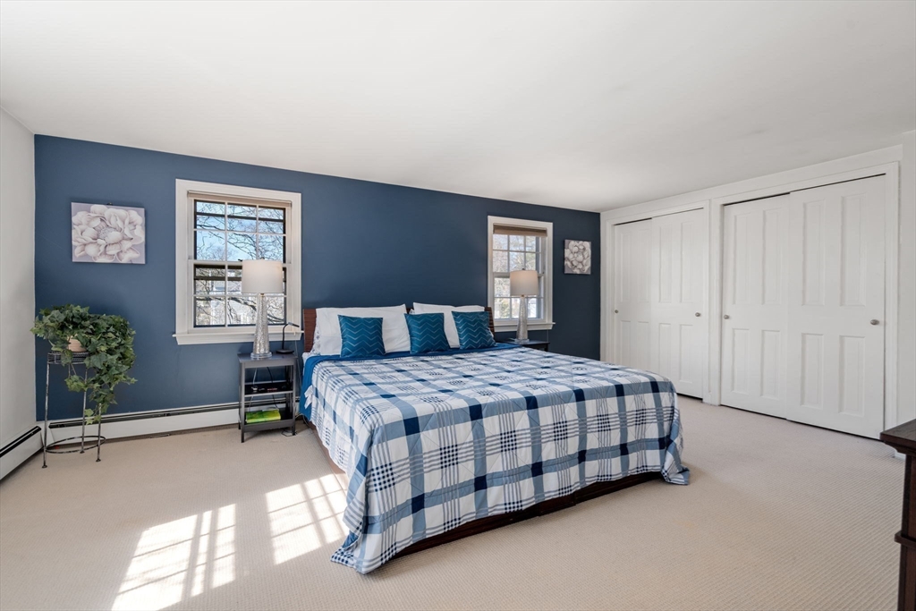 46 Leewood Road Wellesley, MA 02482 - Photo 8 of 16 a bedroom with a bed table and window