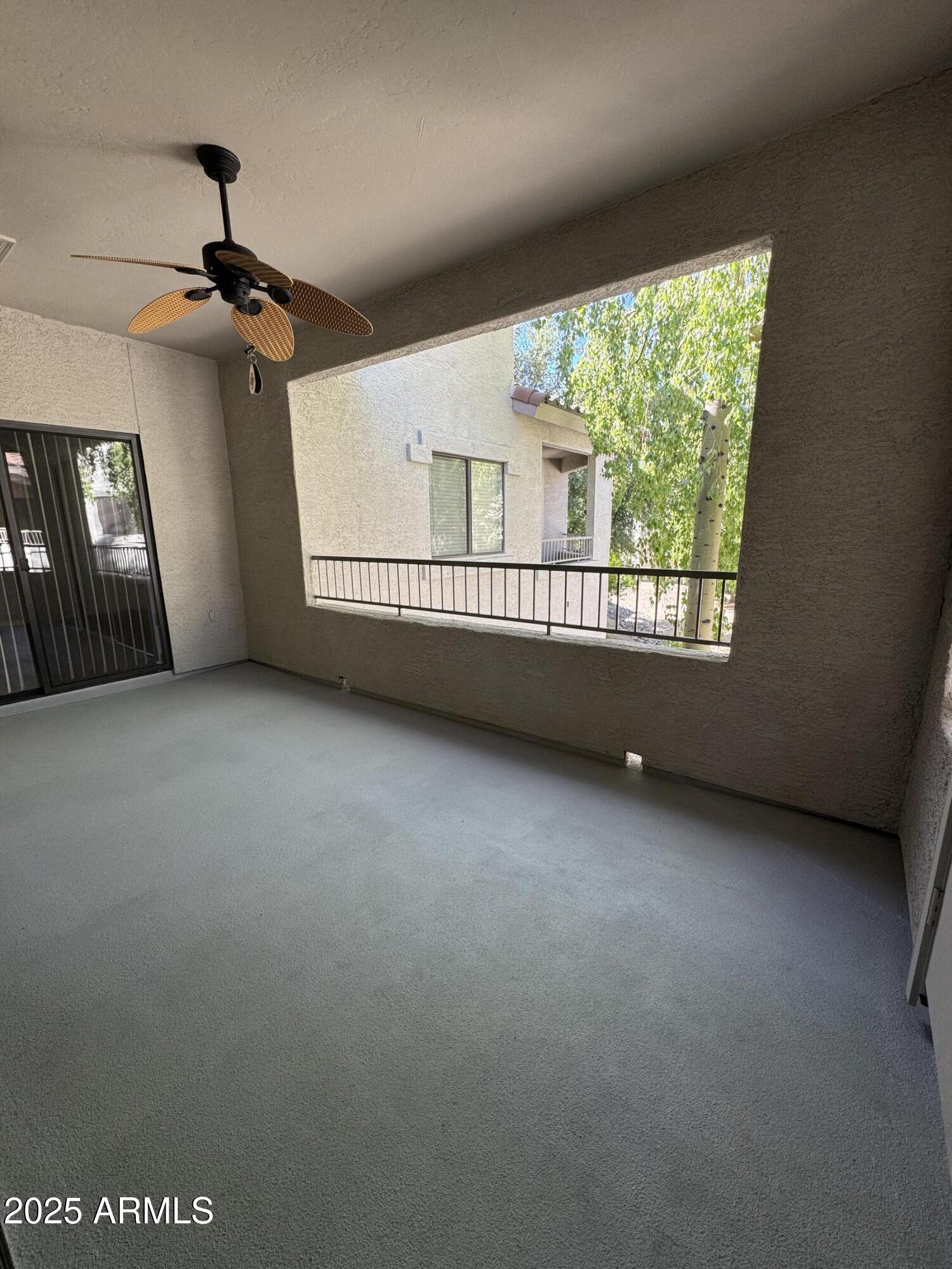 9555 East Raintree Drive, Unit 2008 Scottsdale, AZ 85260 - Photo 15 of 17 a view of an empty room with a window